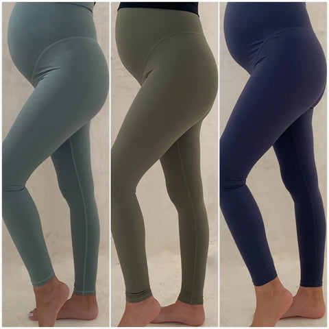 Three pairs of maternity leggings in teal, olive green, and navy for stylish comfort.