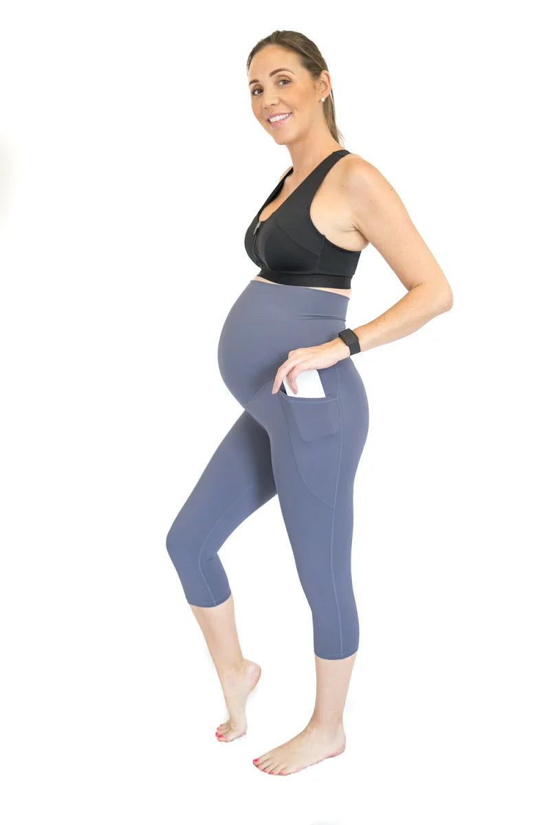 Pregnant woman in workout attire showcasing completely specialised Maternity Leggings