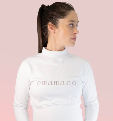 Snow High Neck Jumper in snowiest white with delicately stitched emamaco logo.