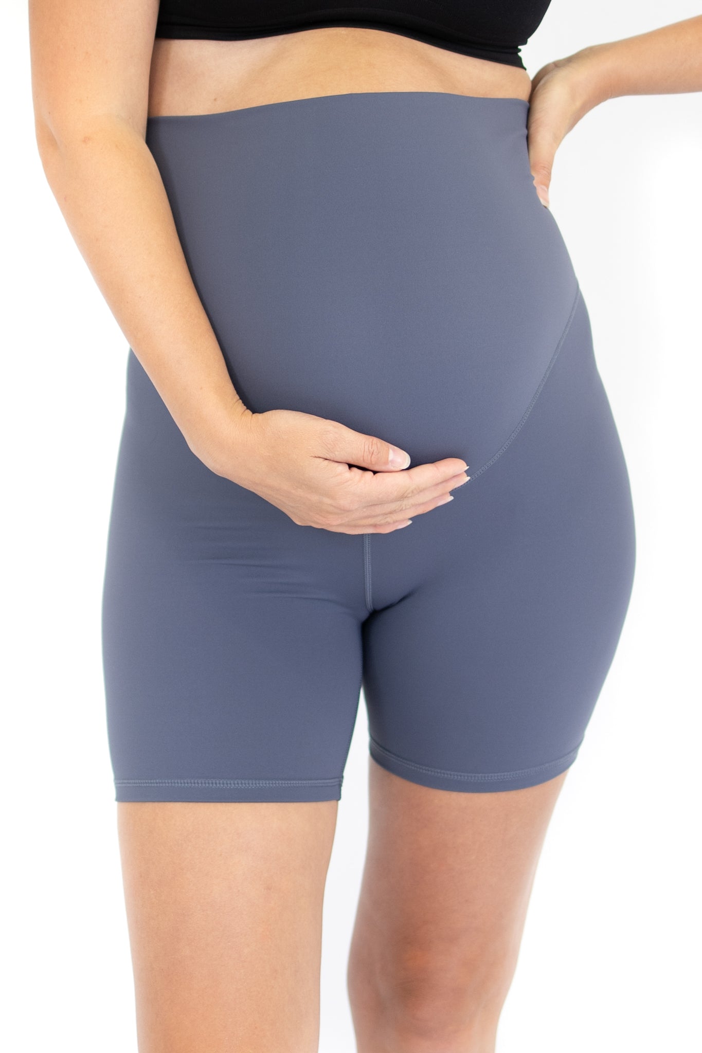 Pregnant woman wearing emama Maternity Bike Shorts in gray for comfortable support