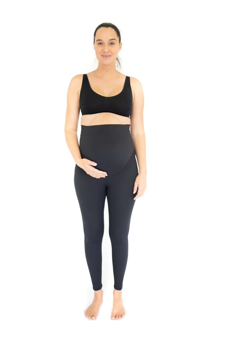 Woman in black Emama Maternity Leggings, a completely specialised workout outfit