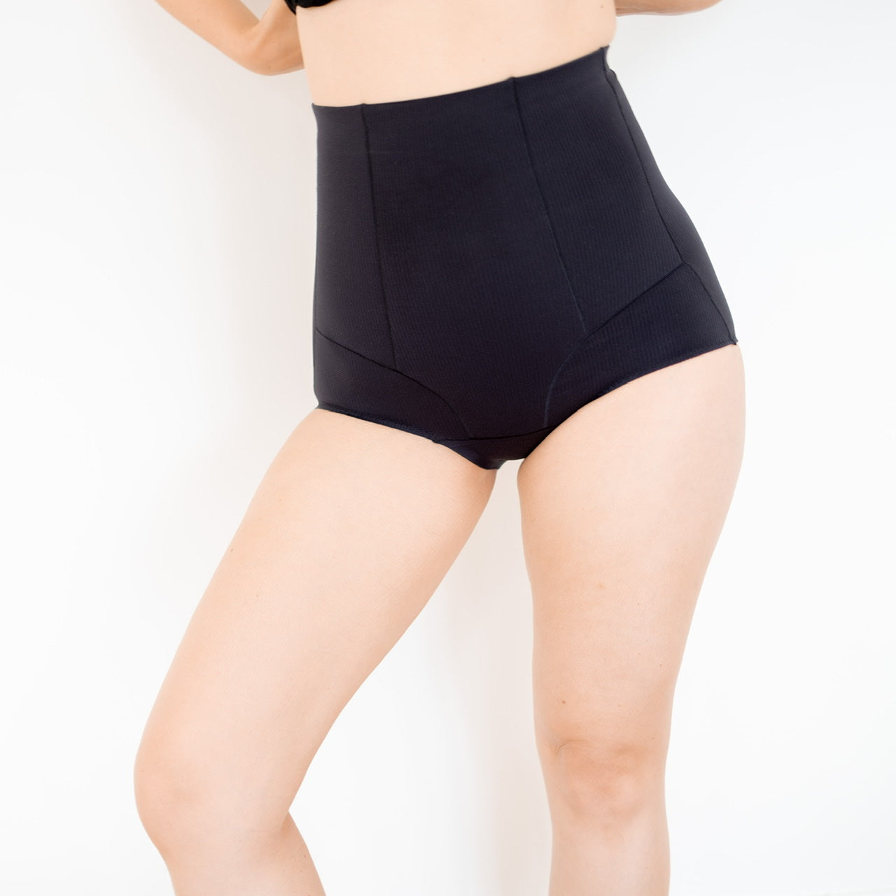 High-waisted black shapewear briefs for effective post pregnancy recovery and support