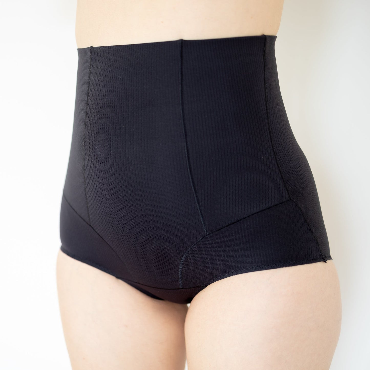 High-waisted black shapewear underwear for effective pregnancy recovery support