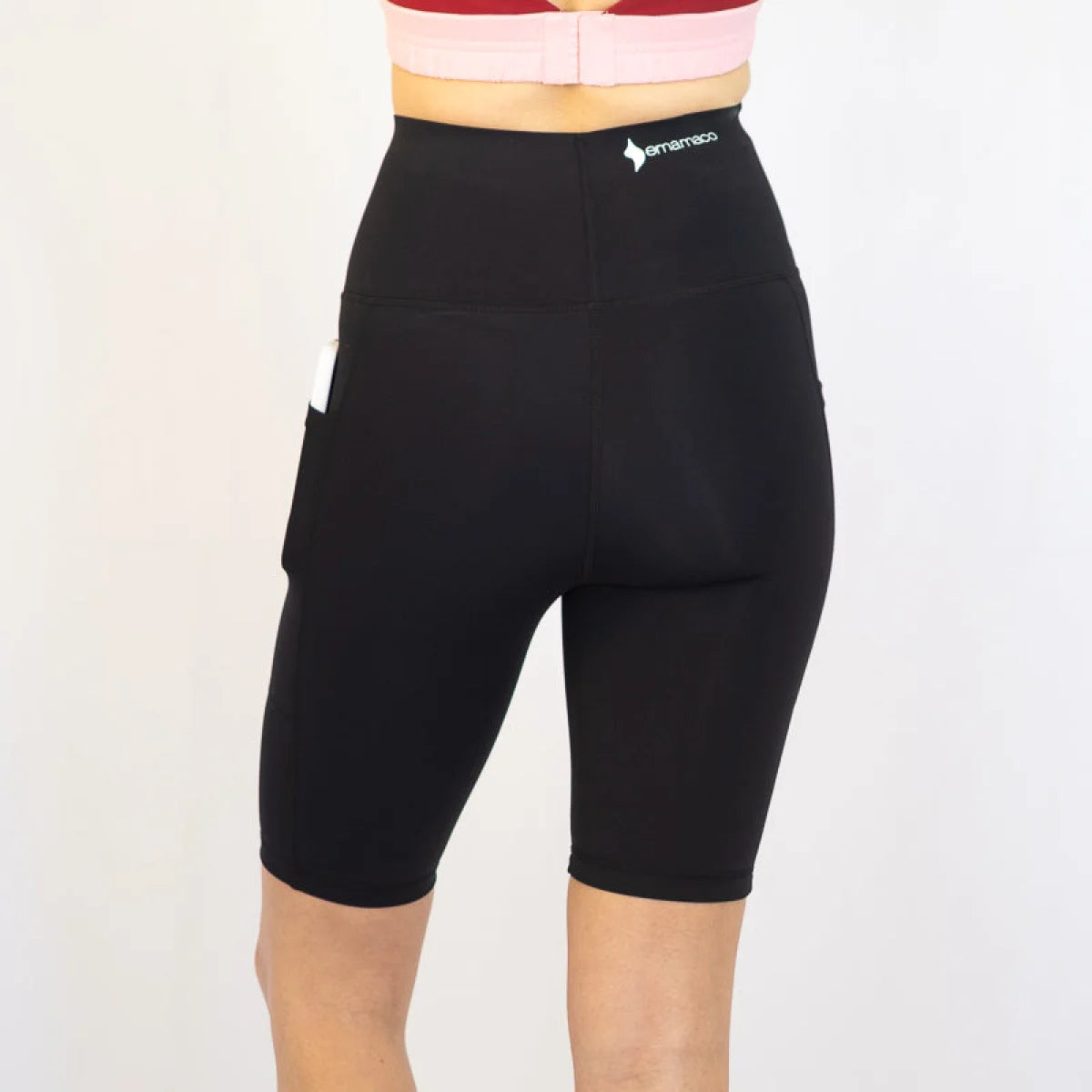 Black high-waisted long shorts with pockets, ideal for workouts and pet hair resistance